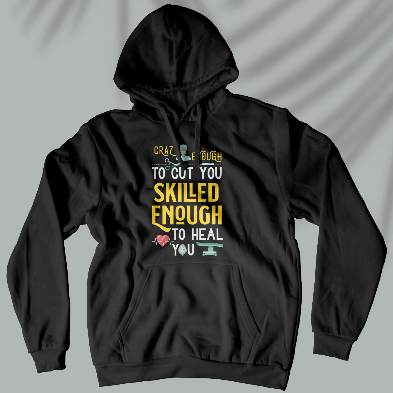 Crazy enough to cut you, skilled enough to heal you - Unisex Hoodie